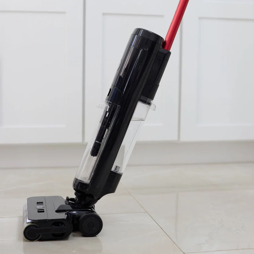 Side profile of the Quantum vacuum standing upright on a tile floor