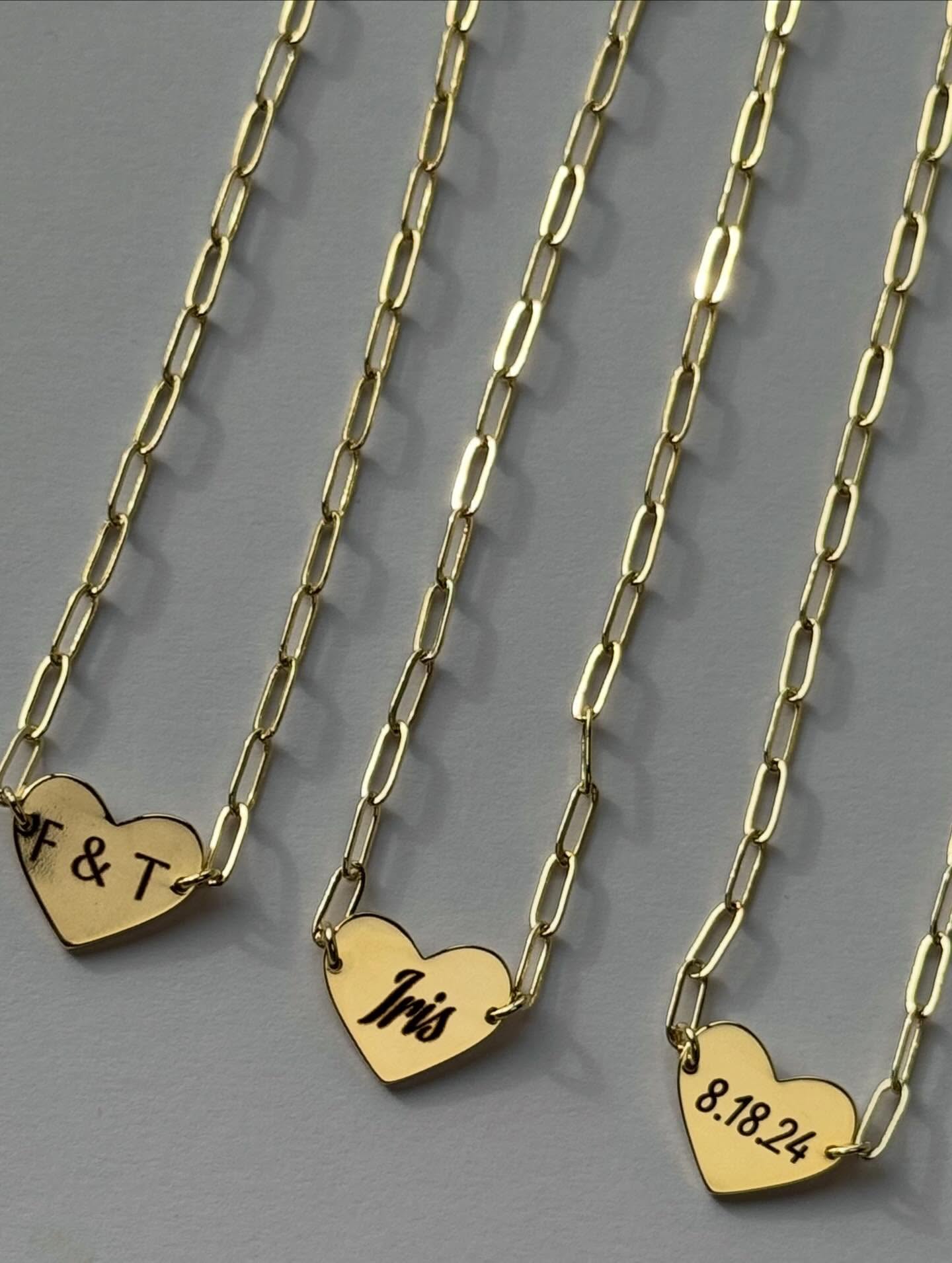 Custom engraved heart tag necklaces with names and dates